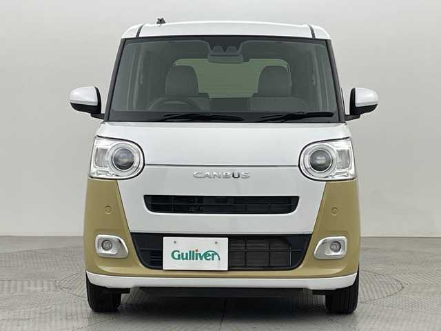 ダイハツ ムーヴ キャンバス ストライプス G 新潟県 2022(令4)年 0.1千km シャイニングホワイトパール/サンドベージュメタリック スマートアシスト/ホッとドリンクホルダー/純正メモリナビ/　CD/DVD/フルセグTV/Bluetooth/バックカメラ/両側パワースライドドア/LEDオートライト/シートヒーター/ステアリングリモコン/電格ミラー/スマートキー