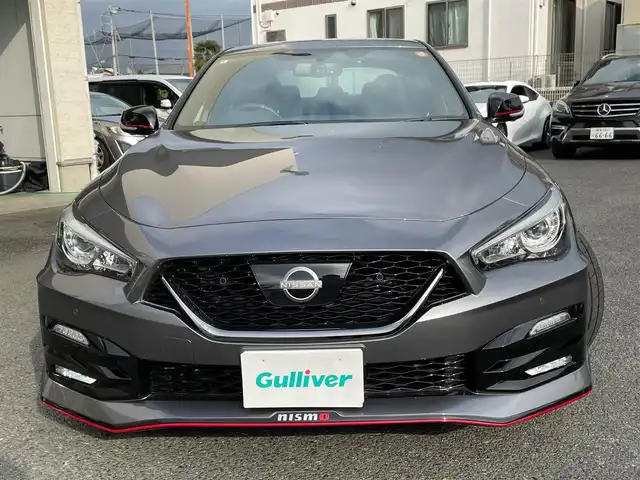 日産 スカイライン ニスモ 神奈川県 2024(令6)年 0.3万km ダークメタルグレー ワンオーナー/サンルーフ/黒革シート/BOSEサウンドシステム/純正メモリーナビ・地デジTV/純正CD/DVD/USB/BT再生/アラウンドビューカメラ/ビルトインETC2.0/ドライブレコーダー/純正19インチAW/レッドブレーキキャリパー/LEDヘッドライト/LEDフォグ/レーダークルーズコントロール/衝突軽減ブレーキ/LKA/BSM/コーナーセンサー/前席パワーシート/シートヒーター/NISMOミラーレンズ/ドアインナーガード/カーボンドアパネル/シフトノブ/パドルシフト/R6/7年ディーラー整備記録/保証書・取説あり