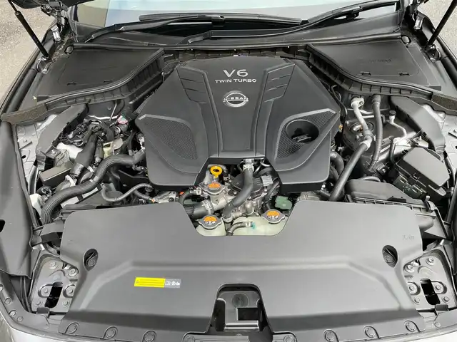 日産 スカイライン ニスモ 神奈川県 2024(令6)年 0.3万km ダークメタルグレー ワンオーナー/サンルーフ/黒革シート/BOSEサウンドシステム/純正メモリーナビ・地デジTV/純正CD/DVD/USB/BT再生/アラウンドビューカメラ/ビルトインETC2.0/ドライブレコーダー/純正19インチAW/レッドブレーキキャリパー/LEDヘッドライト/LEDフォグ/レーダークルーズコントロール/衝突軽減ブレーキ/LKA/BSM/コーナーセンサー/前席パワーシート/シートヒーター/NISMOミラーレンズ/ドアインナーガード/カーボンドアパネル/シフトノブ/パドルシフト/R6/7年ディーラー整備記録/保証書・取説あり