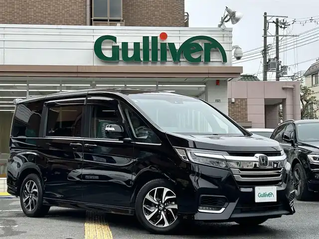 ホンダ ステップワゴン スパーダ ホンダセンシング 大阪府 2018(平30)年 2.5万km プレミアムスパークルブラックパール 純正SDナビ/・フルセグTV/・FM/AM/・Bluetooth/・CD/DVD/バックカメラ/前後ドライブレコーダー/クルーズコントロール/横滑り防止システム/衝突軽減システム/レーンアシスト/わくわくゲート/ビルトインETC/フォグランプ/パドルシフト/ステアリングスイッチ/純正アルミホイール/純正フロアマット/スマートキー×2/取扱説明書/保証書