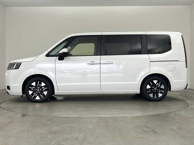 ホンダ ステップワゴン eHEV エアー EX 兵庫県 2025(令7)年 0.1千km プラチナホワイトパール ・登録済未使用車/・11.4インチHonda CONNECTナビ（LXM-247VFLi）/・CD/DVD/BT/SD/・全列USBチャージャー/・フルセグTV/・Honda SENSING/・衝突軽減ブレーキ/・ACC先行車検知音/・先行車発進お知らせ/・路外逸脱抑制機能/・車線維持支援システム/・ブラインドスポットモニター/・標識認識機能/・標識認識機能速度超過お知らせ/・パーキングセンサー/・前後コーナーセンサー/・レーダークルーズコントロール/・バックモニター/・電動パーキングブレーキ/・ブレーキホールド/・減速セレクター/・両側パワースライドドア/・パワーテールゲート/・シートヒーター（運転席＋助手席）/・ウォークスルー/・オットマン/・純正１６インチアルミホイール/・トリプルゾーンコントロール・フルオートエアコンディショナー/・革巻きステアリング/・スマートキー/・スペアキー/・プッシュスタート