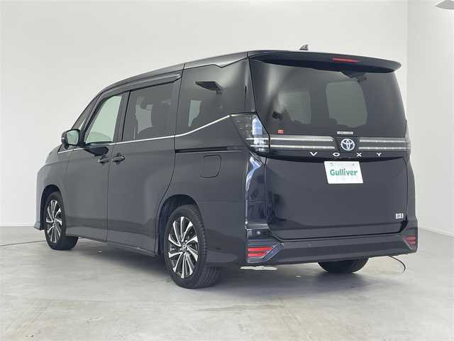 トヨタ ヴォクシー ハイブリッド S－Z 福島県 2023(令5)年 2.2万km スパークリングブラックパールクリスタルシャイン /純正10.5インチディスプレイオーディオPlus//ナビ付/フルセグTV Bluetooth Miracast/CD DVD FM AM HDMI USB//バックカメラ//純正フリップダウンモニター//トヨタセーフティーセンス//アダプティブクルーズコントロール//快適利便パッケージ//ハンズフリーデュアルパワースライドドア//ユニバーサルステップ//パワーバックドア //ステアリングヒーター//オットマン//セカンドシートシートヒーター //フロントシートシートヒーター //電動パーキングブレーキ//ビルトインETC2.0//100Vコンセント