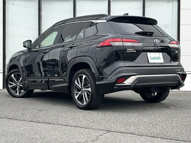 トヨタ カローラ クロス ハイブリッド Z 山形県 2023(令5)年 3.9万km アティチュードブラックマイカ 純正9インチディスプレイオーディオ/（AM/FM/フルセグ/BT/Miracast）/モデリスタエアロ/クルーズコントロール（追従有）/バックカメラ/パノラミックビューモニター/コーナーセンサー/クリアランスソナー/BSM/ステアリングスイッチ/ステアリングヒーター/レザーシート/運転席パワーシート/シートヒーター/オートLEDヘッドライト/オートマチックハイビーム/ワイパーデアイザー/電動パーキング/ビルトインETC/パワーバックドア/ドリンクホルダー
