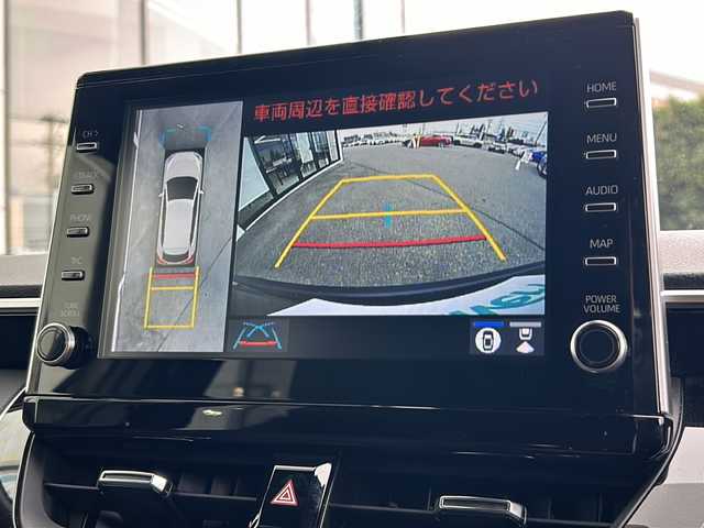 トヨタ カローラ クロス ハイブリッド Z 山形県 2023(令5)年 3.9万km アティチュードブラックマイカ 純正9インチディスプレイオーディオ/（AM/FM/フルセグ/BT/Miracast）/モデリスタエアロ/クルーズコントロール（追従有）/バックカメラ/パノラミックビューモニター/コーナーセンサー/クリアランスソナー/BSM/ステアリングスイッチ/ステアリングヒーター/レザーシート/運転席パワーシート/シートヒーター/オートLEDヘッドライト/オートマチックハイビーム/ワイパーデアイザー/電動パーキング/ビルトインETC/パワーバックドア/ドリンクホルダー