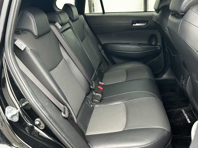 トヨタ カローラ クロス ハイブリッド Z 山形県 2023(令5)年 3.9万km アティチュードブラックマイカ 純正9インチディスプレイオーディオ/（AM/FM/フルセグ/BT/Miracast）/モデリスタエアロ/クルーズコントロール（追従有）/バックカメラ/パノラミックビューモニター/コーナーセンサー/クリアランスソナー/BSM/ステアリングスイッチ/ステアリングヒーター/レザーシート/運転席パワーシート/シートヒーター/オートLEDヘッドライト/オートマチックハイビーム/ワイパーデアイザー/電動パーキング/ビルトインETC/パワーバックドア/ドリンクホルダー