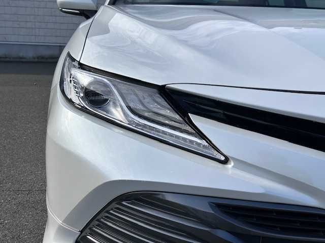 トヨタ カムリ G 大阪府 2018(平30)年 5.5万km プラチナホワイトパールマイカ 純正ナビ(BT/フルセグ/AUX/DVD)/バックカメラ/レーダークルーズコントロール/衝突被害軽減システム/レーンキープアシスト/盗難防止装置/横滑り防止装置/モデリスタ/純正フロアマット/社外アルミホイール/ETC/LEDヘッドライト/オートライト/オートマチックハイビーム/スペアキー/エンジンスタートボタン