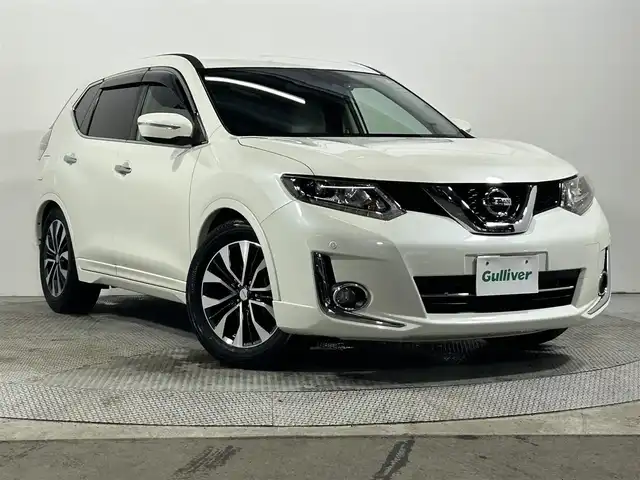 日産 エクストレイル モード・プレミア 大阪府 2016(平28)年 5.1万km ブリリアントホワイトパール 純正SDナビ（CD/DVD/Bluetooth）/フルセグTV/バックカメラ/社外フリップダウンモニター/純正ドライブレコーダー/衝突被害軽減システム/コーナーセンサー/シートヒーター/アイドリングストップ/プッシュスタート/LEDヘッドライト/フォグランプ/ETC/オートライト
