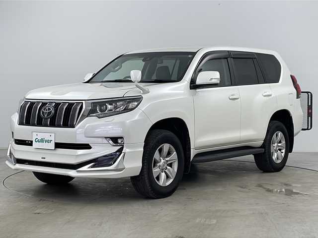 トヨタ ランドクルーザー プラド TX 道央・札幌 2020(令2)年 3.7万km ホワイトパールクリスタルシャイン ・ワンオーナー/・寒冷地仕様/・純正ナビ(CD＆DVD＆SD＆BT＆フルセグ)/・レーン・ディパーチャー・アラート/・プリクラッシュセーフティ/・ロードサインアシスト/・先行車発進告知/・レーダークルーズコントロール/・ステアリングスイッチ/・バックカメラ/・バックフォグ/・社外ドライブレコーダー/・全席シートカバー/・純正フロアマット/・ドアミラーヒーター/・オートマチックハイビーム/・純正エンジンスターター/・純正17インチアルミホイール/・社外ヒッチメンバー/・社外ルーフキャリア/・フロントモデリスタエアロ/・LEDヘッドライト/・LEDフォグランプ/・社外ヒッチメンバー/・社外キャリア