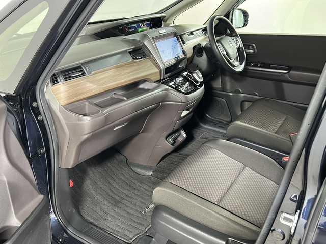 ホンダ フリード ハイブリット G ホンダセンシング 広島県 2021(令3)年 6.4万km ミッドナイトブルービームM 禁煙車/ホンダセンシング/・衝突軽減ブレーキ/・追従式クルーズコントロール/・LKAS/コーナーセンサー/純正9型ナビ（VXM-217VFNi)/・フルセグ/CD/DVD/Bluetooth/SD/REC//HDMI/USB/バックカメラ/両側パワースライドドア/オートリトラミラー/LEDヘッドライト＋アクティブコーナリングライト/Cパッケージ/・ロールサンシェード/・シートヒーター/・コンフォートビューパッケージ/・プラズマクラスターエアコン/前後ドライブレコーダー（ユピテル）/ETC/純正ドアバイザー/社外17インチアルミホイール