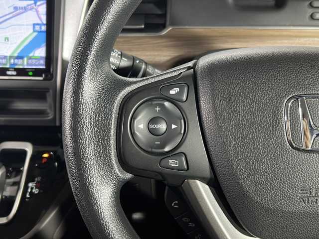 ホンダ フリード ハイブリット G ホンダセンシング 広島県 2021(令3)年 6.4万km ミッドナイトブルービームM 禁煙車/ホンダセンシング/・衝突軽減ブレーキ/・追従式クルーズコントロール/・LKAS/コーナーセンサー/純正9型ナビ（VXM-217VFNi)/・フルセグ/CD/DVD/Bluetooth/SD/REC//HDMI/USB/バックカメラ/両側パワースライドドア/オートリトラミラー/LEDヘッドライト＋アクティブコーナリングライト/Cパッケージ/・ロールサンシェード/・シートヒーター/・コンフォートビューパッケージ/・プラズマクラスターエアコン/前後ドライブレコーダー（ユピテル）/ETC/純正ドアバイザー/社外17インチアルミホイール