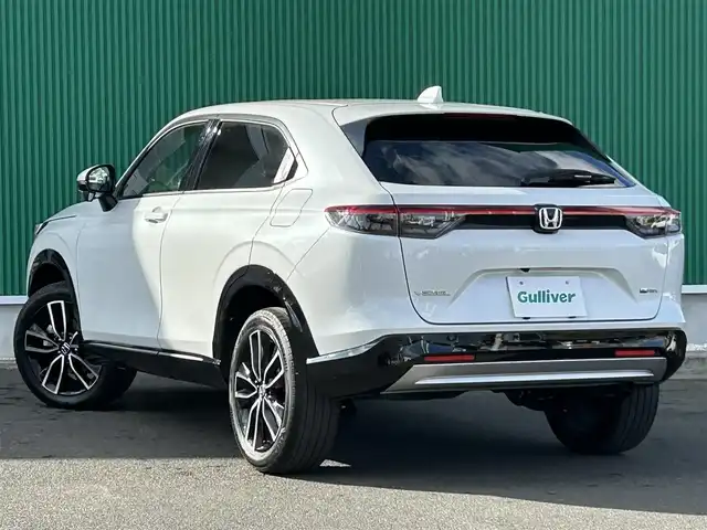 ホンダ ヴェゼル ハイブリッド e:HEV Z 宮城県 2024(令6)年 3.8万km プラチナホワイトパール Honda CONNECTディスプレー（9インチ）/・Bluetooth/・フルセグTV/・バックカメラ/＋ETC2.0車載器/＋ワイヤレス充電器/後退出庫サポート/＝＝＝/ワンオーナー/ホンダセンシング/・衝突軽減ブレーキ/・誤発進抑制機能/・後方誤発進抑制機能/・近距離衝突軽減ブレーキ/・歩行者事故低減ステアリング/・路外逸脱抑制機能/・渋滞追従機能付アダプティブクルーズコントロール/・車線維持支援システム/・先行車発進お知らせ機能/・標識認識機能/・オートハイビーム/・パーキングセンサーシステム/ブラインドスポットインフォメーション/ハンズフリーパワーバックドア/ハーフレザーシート/シートヒーター/ステアリングヒーター/革巻きステアリング/ステアリングスイッチ/パドルシフト/LEDヘッドランプ/LEDアクティブコーナリングライト/シーケンシャルターンランプ/オートライト/電動パーキングブレーキ/ブレーキホールド/スマートキー＆プッシュスタート/純正18インチAW