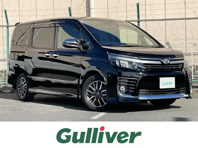 トヨタ ヴォクシー ZS 煌Ⅱ 東京都 2016(平28)年 6.5万km ブラック 純正ナビ　/両側電動ドア　/フルセグＴＶ　/ビルトイン２．０ＥＴＣ　/オートライト　/ＬＥＤヘッド　/スマートキー　/スペアキー　/バックカメラ　/Ｂｌｕｅｔｏｏｔｈ　/DVD再生　/レーンキープ　/衝突被害軽減　/禁煙