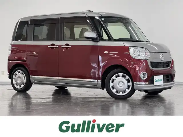 ダイハツ ムーヴ キャンバス G メイクアップ SA Ⅲ 三重県 2017(平29)年 6.9万km スムースグレーマイカメタリック/ファイアークォーツレッドメタリック 2トーン ガソリン/FF/インパネCVT/純正 8インチナビ NSZN-X67D/（TV/CD/DVD/iPod/MEMORY MUSIC/SD/Bluetooth/FM/AM/USB/HDMI/ドラレコ）/バックカメラ/両側パワースライドドア/ドライブレコーダー 前方（ナビ連動）/ETC/衝突回避支援システム スマートアシスト3/・衝突警報機能（対車両・対歩行者）/・衝突回避支援ブレーキ機能（対車両・対歩行者）/・誤発進抑制制御機能（前方・後方）/・車線逸脱警報機能/・オートハイビーム機能/など/装備/・オートエアコン/・オートライト/・LEDヘッドランプ（AFS・オートレベリング機能・LEDクリアランスランプ付）/・LEDフロントフォグランプ/・ステアリングスイッチ/・プッシュスタート/・助手席大型シートアンダートレイ/・純正ホイールキャップ＋14インチスチールホイール/・取/ナビ取/・スマートキーx1/など