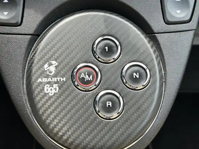 アバルト ６９５ エディツィオーネ マセラティ 新潟県 2013(平25)年 6万km パープル JBL/社外ナビ/(AM/FM/CD/DVD/BT/フルセグ)/バックカメラ/ETC/パドルシフト/レーダー探知機(GWR83sda)/レザーシート/革巻きステアリング/ステアリングスイッチ/HIDヘッドライト/フォグランプ/リモコンキー/オープン可能/幌をブラックに塗装/カラーコード：１４２/カラー名：ポンテヴェッキオボルドー