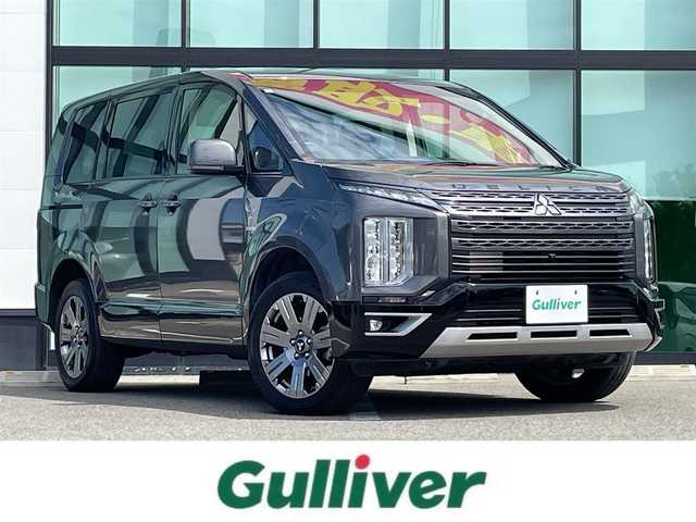 三菱 デリカＤ：５ ジャスパー 和歌山県 2021(令3)年 6.3万km アイガーグレーM/ダイヤモンドブラックマイカ 1オーナー/特別仕様車　/ジャスパー/社外ナビ /BT /フルセグ/ラジオ/USB/全方位カメラ/バックカメラ/ETC/両側パワースライドドア/e‐Assist/衝突被害軽減ブレーキシステム「FCM」/車線逸脱警報システム「LDW」/レーダークルーズコントロールシステム「ACC」/オートマチックハイビーム「AHB」/革巻きステアリング/パドルシフト/前後ドライブレコーダー/オートライト/社外フロアマット/純正アルミホイール/2列目チップアップシート/ハーフレザーシート/スマートキー×2/新車時保証書/取扱説明書