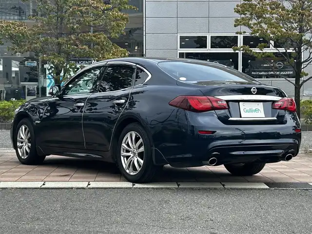 日産 フーガ ハイブリッド 福島県 2020(令2)年 3.7万km ダークブルー 純正ナビ/「TV・CD・FM・AM」/クルーズコントロール/レーンキープアシスト/前後ドライブレコーダー/ビルトインETC/アラウンドビューカメラ/バックカメラ/純正18インチアルミホイール/純正フロアマット/シートポジションメモリー/パワーシート/助手席オットマン機構/LEDヘッドライト