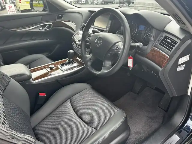 日産 フーガ ハイブリッド 福島県 2020(令2)年 3.7万km ダークブルー 純正ナビ/「TV・CD・FM・AM」/クルーズコントロール/レーンキープアシスト/前後ドライブレコーダー/ビルトインETC/アラウンドビューカメラ/バックカメラ/純正18インチアルミホイール/純正フロアマット/シートポジションメモリー/パワーシート/助手席オットマン機構/LEDヘッドライト
