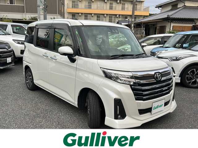 トヨタ ルーミー カスタムG 大阪府 2021(令3)年 2.5万km パールホワイトⅢ ワンオーナー/両側パワースライドドア/レーダークルコン/マルチテレインモニター/コーナーセンサー/前席シートヒーター/純正9インチSDナビ/　CD.DVD.BT.フルセグTV/スマートキー×2/プッシュスタート/TZドライブレコーダー/ビルトインETC/純正フロアマット/保証書.取説
