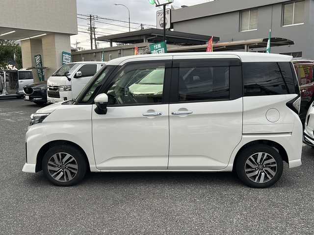 トヨタ ルーミー カスタムG 大阪府 2021(令3)年 2.5万km パールホワイトⅢ ワンオーナー/両側パワースライドドア/レーダークルコン/マルチテレインモニター/コーナーセンサー/前席シートヒーター/純正9インチSDナビ/　CD.DVD.BT.フルセグTV/スマートキー×2/プッシュスタート/TZドライブレコーダー/ビルトインETC/純正フロアマット/保証書.取説