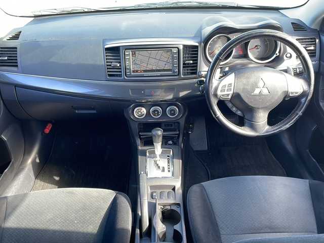三菱 ギャラン フォルティス スポーツバック スポーツ 岩手県 2008(平20)年 11万km シルキーホワイト 純正ＨＤＤナビ　バックカメラ　ＣＤ／ＤＶＤ再生　ＴＶ　クルーズコントロール　パドルシフト　ステアリングスイッチ　１２Ｖソケット　スマートキー　スペアタイヤ　ＨＩＤオートライト　１６インチＡＷ