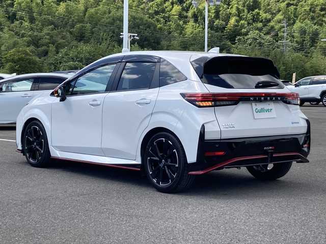 日産 オーラ ニスモ 佐賀県 2023(令5)年 2.1万km ピュアホワイトパール ワンオーナー/純正９インチナビ/アラウンドビューモニター＆MOD/プロパイロット/エマージェンシーブレーキ/LDW/BSM/コーナーセンサー/インテリジェントルームミラー/電動パーキングブレーキ/オートブレーキホールド/NISMOブラックハーフレザーシート/ETC2.0/プッシュスタート/インテリジェントキー/LEDヘッドライト/フォグライト/純正アルミホイール