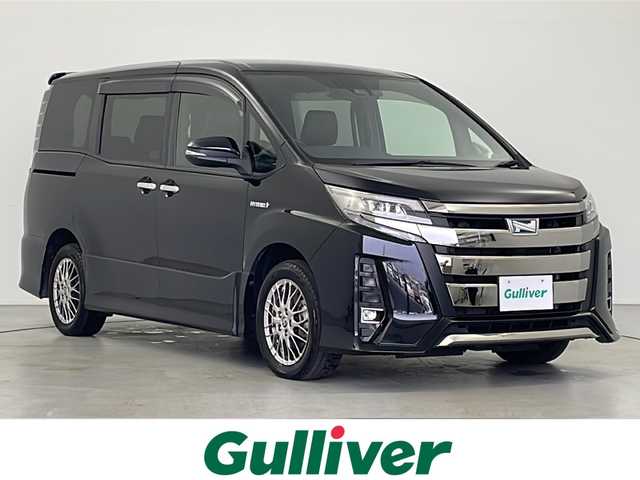 トヨタ ノア ハイブリッド Si ダブルバイビーⅡ 岐阜県 2019(令1)年 5.9万km ブラック 純正９型ナビ（NSZT-Y68T）/AM/FM/フルセグ/Bluetooth/CD/DVD/SD/バックカメラ　/ビルトインＥＴＣ２．０　/前方ドラレコ（DRT-C68T）/両側パワースライドドア　/シートヒーター　/ＬＥＤヘッドランプ　/フォグランプ　/クルーズコントロール/ハーフレザー　/純正フロアマット/純正１６AW/トヨタセーフティーセンス　/プリクラッシュセーフティ/レーンディパーチャーアラート/オートマチックハイビーム/インテリジェントクリアランスソナー/USB端子/スペアタイヤ