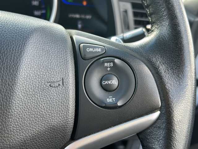 ホンダ フィット ハイブリット Sパッケージ 石川県 2015(平27)年 6.1万km ホワイトオーキッドパール 社外８インチＳＤナビ/フルセグＴＶ/バックカメラ/Ｂｌｕｅｔｏｏｔｈ/ＥＴＣ/プッシュスタート/ＬＥＤライト/オートライト/クルーズコントロール/スペアキー有/純正サイドエアロ/純正アルミホイール/カーテンエアバッグ/リアウィング