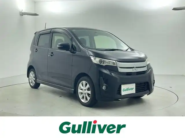 三菱 ｅＫカスタム G 福井県 2013(平25)年 11.7万km アメジストブラック 社外ナビ/シートヒーター/バックカメラ/AAC/純正アルミホイール/スマートキー/プッシュスタート/フォグランプ/革巻きステアリング/純正フロアマット/ウインカーミラー