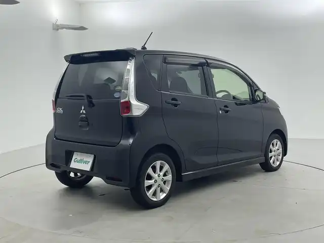 三菱 ｅＫカスタム G 福井県 2013(平25)年 11.7万km アメジストブラック 社外ナビ/シートヒーター/バックカメラ/AAC/純正アルミホイール/スマートキー/プッシュスタート/フォグランプ/革巻きステアリング/純正フロアマット/ウインカーミラー