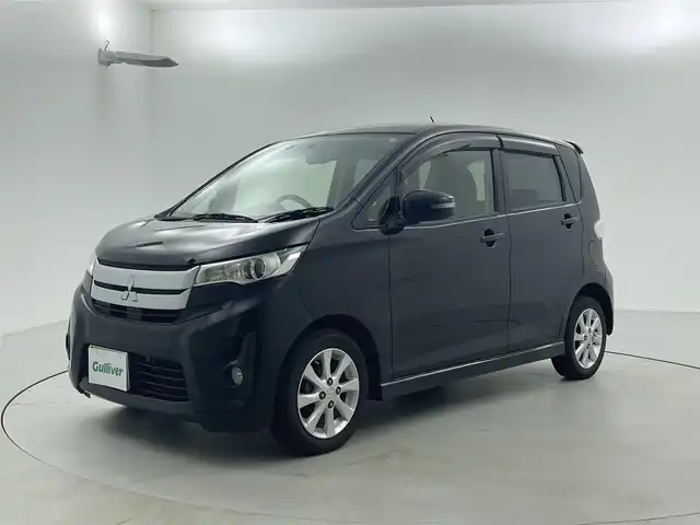 三菱 ｅＫカスタム G 福井県 2013(平25)年 11.7万km アメジストブラック 社外ナビ/シートヒーター/バックカメラ/AAC/純正アルミホイール/スマートキー/プッシュスタート/フォグランプ/革巻きステアリング/純正フロアマット/ウインカーミラー
