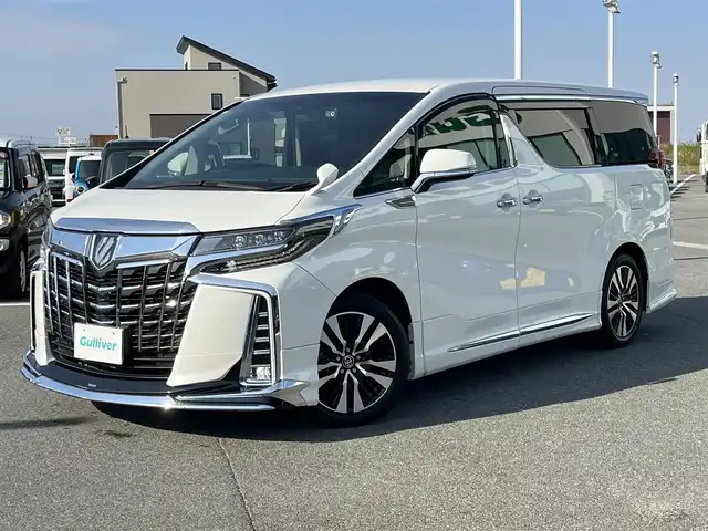 トヨタ アルファード S Cパッケージ 奈良県 2022(令4)年 2.8万km ホワイトパールクリスタルシャイン モデリスタエアロ/ワンオーナー/純正9インチディスプレイオーディオ/（TV/BT/AppleCarPlay/AndroidAuto）/純正12インチフリップダウンモニター（V12T-R68C）/レーダークルーズコントロール/バックカメラ/前後コーナーセンサー/プリクラッシュセーフティ/レーンキープアシスト/両側パワースライドドア/パワーバックドア/レザーシート/運転席メモリーシート/全席パワーシート/前席シートヒーター/エアーシート/ステアリングヒーター/後席サンシェード/LEDヘッドライト/ETC/前後ドライブレコーダー（DC-DR652）/純正18インチAW/保証書/取り扱い説明書/スペアキーX1