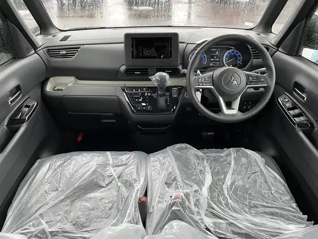 三菱 デリカミニ T プレミアム 道南・函館 2025(令7)年 0.1千km Ｄグリーン /全周囲カメラ//デジタルインナーミラー//ハンドルウォーマー//シートヒーター//両側パワースライドドア//ルーフレール//衝突被害軽減ブレーキ//レーダクルーズコントロール//オートハイビーム//コーナーセンサー