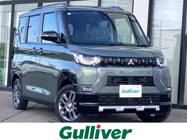 三菱 デリカミニ T プレミアム 道南・函館 2025(令7)年 0.1千km Ｄグリーン /全周囲カメラ//デジタルインナーミラー//ハンドルウォーマー//シートヒーター//両側パワースライドドア//ルーフレール//衝突被害軽減ブレーキ//レーダクルーズコントロール//オートハイビーム//コーナーセンサー