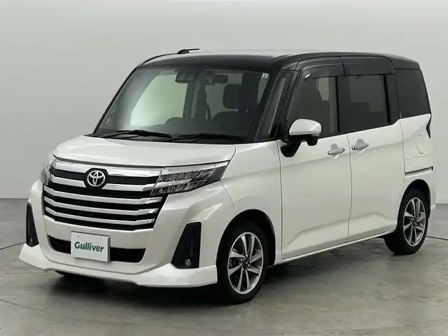 トヨタ ルーミー カスタムG 福岡県 2023(令5)年 3.8万km ブラックマイカメタリック/パールホワイト2トーン 純正９型ディスプレイオーディオ（ＢＴ，フルセグＴＶ）　/全方位カメラ　/ビルトインＥＴＣ　/前後ドラレコ　/ＡＣＣ　/コーナーセンサー　/衝突軽減ブレーキ　/両側電動スライドドア　/シートヒーター　/社外１５インチＡＷ