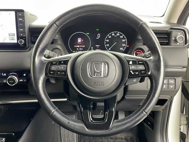 ホンダ ヴェゼル ハイブリッド e:HEV Z 道央・札幌 2021(令3)年 3万km プラチナホワイトパール ・4WD/・純正ナビ/　CD/DVD/SD/BT/USB/・フルセグTV/・バックカメラ/・社外前後ドライブレコーダー/・HONDA SENSING/　衝突軽減/　踏み間違え防止/　レーンキープアシスト/　標識認識/　アダプティブクルーズコントロール/　先行車発進お知らせ/　路外逸脱防止/・ブラインドスポットモニター/・前席シートヒーター/・革巻ステアリング/・ステアリングヒーター/・ステアリングリモコン/・パドルシフト/・ハンズフリーパワーバックドア /・ミラーヒーター/・オートライト/・LEDヘッドライト/・フォグランプ/・ワイパーデアイサー /・ETC/・純正フロアマット/・ドアバイザー/・18インチ純正アルミホイール/・積込タイヤ/・スペアキー/・取扱説明書/・保証書