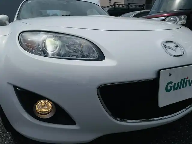 マツダ ロードスター VS RHT 愛知県 2012(平24)年 5.6万km クリスタルホワイトパールマイカ 純正ナビ(BT/AM/FM/SD/DVD)/社外柿本マフラー/BLITZ車高調/BBS社外ホイール/リアスポイラー/パドルシフト/HIDヘッドライト/純正マフラー(積込み)/純正サスペンション(積込み)/ETC/純正フロアマット/ハーフレザーシート/シートヒーター/フォグランプ