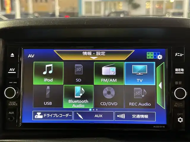 日産 ＮＶ１００クリッパー リオ E 愛媛県 2021(令3)年 3万km ＤグリーンＭ 登録時走行距離29902km/純正ナビ（MJ321D-W）/CD/DVD/TV/BT/バックカメラ/ETC/前後ドラレコ（ナビ連動）/衝突軽減ブレーキ/横滑り防止装置/リヤコーナーセンサー/オートライト/LEDヘッドライト/ハロゲンフォグランプ/助手席パワースライドドア/オートエアコン/リヤクーラー/スマートキー/運転席シートヒーター/純正フロアマット/純正アルミホイール
