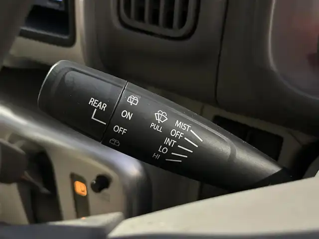 日産 ＮＶ１００クリッパー リオ E 愛媛県 2021(令3)年 3万km ＤグリーンＭ 登録時走行距離29902km/純正ナビ（MJ321D-W）/CD/DVD/TV/BT/バックカメラ/ETC/前後ドラレコ（ナビ連動）/衝突軽減ブレーキ/横滑り防止装置/リヤコーナーセンサー/オートライト/LEDヘッドライト/ハロゲンフォグランプ/助手席パワースライドドア/オートエアコン/リヤクーラー/スマートキー/運転席シートヒーター/純正フロアマット/純正アルミホイール