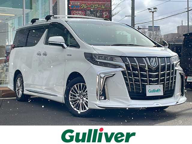 トヨタ アルファードハイブリット SR 道央・札幌 2020(令2)年 4.9万km ホワイトパールクリスタルシャイン ・4WD/・衝突軽減ブレーキ/・純正ナビ/BT&USB&フルセグTV/・バックカメラ/・両側パワースライドドア/・パワーバックドア/・フリップダウンモニター/・エアロパーツ(フロント、サイド、リアアンダー)/・レザーシート/・前席両側シートヒーター/・前席両側エアシート/・前席両側パワーシート/・D席のみメモリシート/・オットマン(N席・2列目)/・サンシェード/・ウォークスルー/・ハンズフリー/・ステアリングスイッチ/・前後コーナーセンサー/・前後クリアランスソナー/・レーダークルーズコントロール/・前後ドライブレコーダー/・ETC/・デジタルインナーミラー/・横滑り防止装置/・レーンキープアシスト/・盗難防止装置/・オートライト/・オートマチックハイビーム/・LEDヘッドライト/・フォグランプ/・オートリトラミラー/・ウィンカーミラー/・純正フロアマット/・純正AW付夏タイヤ