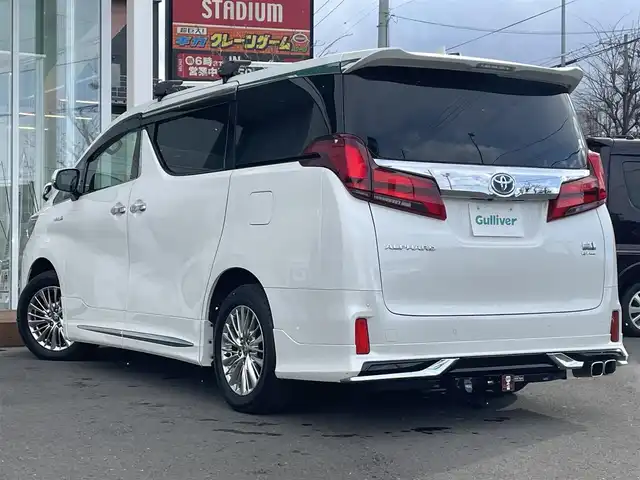 トヨタ アルファードハイブリット SR 道央・札幌 2020(令2)年 4.9万km ホワイトパールクリスタルシャイン ・4WD/・衝突軽減ブレーキ/・純正ナビ/BT&USB&フルセグTV/・バックカメラ/・両側パワースライドドア/・パワーバックドア/・フリップダウンモニター/・エアロパーツ(フロント、サイド、リアアンダー)/・レザーシート/・前席両側シートヒーター/・前席両側エアシート/・前席両側パワーシート/・D席のみメモリシート/・オットマン(N席・2列目)/・サンシェード/・ウォークスルー/・ハンズフリー/・ステアリングスイッチ/・前後コーナーセンサー/・前後クリアランスソナー/・レーダークルーズコントロール/・前後ドライブレコーダー/・ETC/・デジタルインナーミラー/・横滑り防止装置/・レーンキープアシスト/・盗難防止装置/・オートライト/・オートマチックハイビーム/・LEDヘッドライト/・フォグランプ/・オートリトラミラー/・ウィンカーミラー/・純正フロアマット/・純正AW付夏タイヤ