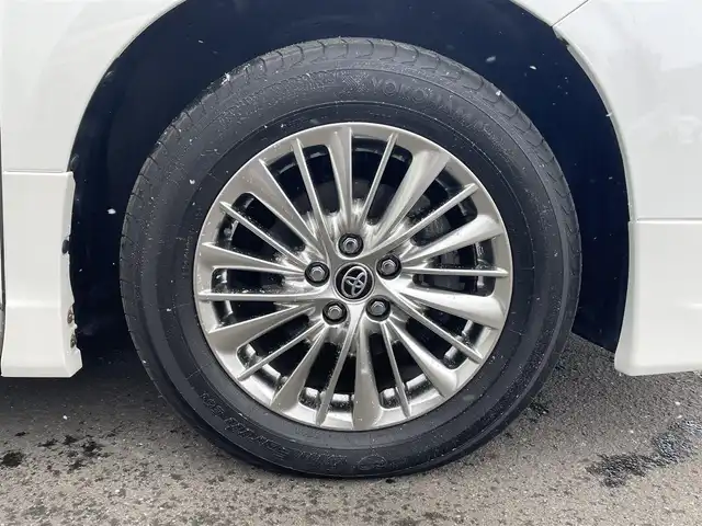 トヨタ アルファードハイブリット SR 道央・札幌 2020(令2)年 4.9万km ホワイトパールクリスタルシャイン ・4WD/・衝突軽減ブレーキ/・純正ナビ/BT&USB&フルセグTV/・バックカメラ/・両側パワースライドドア/・パワーバックドア/・フリップダウンモニター/・エアロパーツ(フロント、サイド、リアアンダー)/・レザーシート/・前席両側シートヒーター/・前席両側エアシート/・前席両側パワーシート/・D席のみメモリシート/・オットマン(N席・2列目)/・サンシェード/・ウォークスルー/・ハンズフリー/・ステアリングスイッチ/・前後コーナーセンサー/・前後クリアランスソナー/・レーダークルーズコントロール/・前後ドライブレコーダー/・ETC/・デジタルインナーミラー/・横滑り防止装置/・レーンキープアシスト/・盗難防止装置/・オートライト/・オートマチックハイビーム/・LEDヘッドライト/・フォグランプ/・オートリトラミラー/・ウィンカーミラー/・純正フロアマット/・純正AW付夏タイヤ