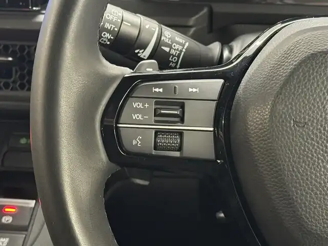 ホンダ ステップワゴン スパーダ eHEV プレミアムライン 三重県 2022(令4)年 3万km プラチナホワイトパール ハイブリッド/FF/MTモード付インパネCVT/純正 11.4インチナビ LXM-237VFLi/（CD/DVD/FM/AM/TV/Music Rack/SD/USB/iPod/Bluetooth/CarPlay/AndroidAuto）/純正 15.6インチ 後席ディスプレイ VM-231FE/【OP】マルチビューカメラシステム/両側パワースライドドア/ドライブレコーダー 前後/ETC/Honda SENSING/・衝突軽減ブレーキ/・車線維持支援システム/・路外逸脱抑制機能/・渋滞追従機能付アダプティブクルーズコントロール＆トラフィックジャムアシスト/・ブラインドスポットインフォメーション/・先行車発進お知らせ機能/・オートハイビーム・アダプティブドライビングビーム/・誤発進抑制機能（前・後）/・パーキングセンサー（前後）/など/装備/・2列目オットマンシート/・パワーテールゲート/・ハーフレザー/・シートヒーター（D/N/2nd）/・左右、後席独立オートエアコン/・電子パーキングブレーキ＆ブレーキホールド機能/・ステアリングスイッチ/・パドルシフト/・オートライト/・LEDヘッドライト＆フォグライト/・プッシュスタート/・スマートキーx2/・保/取/ナビ取/など