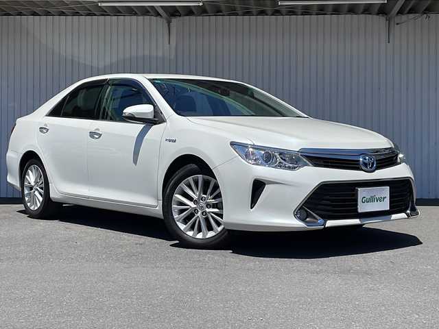 トヨタ カムリ ハイブリット Gパッケージ 長野県 2015(平27)年 2.3万km ホワイトパールクリスタルシャイン ワンオーナー/純正メモリナビTV/バックカメラ /ETC/前後ドライブレコーダー/純正１７インチアルミ/社外AW付き冬タイヤ積込/パワーシート/保証書・取説/スペアキー