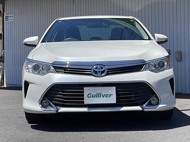 トヨタ カムリ ハイブリット Gパッケージ 長野県 2015(平27)年 2.3万km ホワイトパールクリスタルシャイン ワンオーナー/純正メモリナビTV/バックカメラ /ETC/前後ドライブレコーダー/純正１７インチアルミ/社外AW付き冬タイヤ積込/パワーシート/保証書・取説/スペアキー
