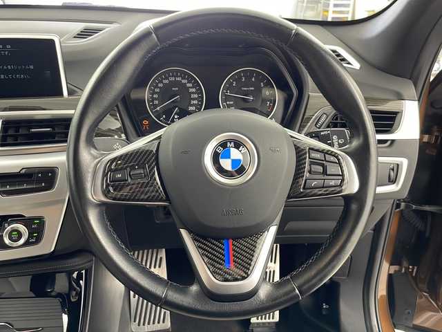 ＢＭＷ Ｘ１ xDrive 20i 道央・札幌 2015(平27)年 9万km ドニントングレーM ・４WD/ターボ/・サンルーフ/・純正メーカーナビ/・DVD.CD.フルセグ/・レザーシート/パワーシート/・シートヒーター/・クルーズコントロール/・リアパワーバックドア /・キセノンライト/オートライト/・ビルトインETC/・ドライブレコーダー/・スマートキー