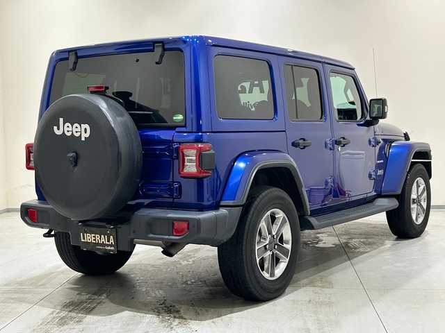 クライスラー・ジープ ジープ ラングラー アンリミテッド サハラ 熊本県 2020(令2)年 5.7万km 青 ・スマートキー/・プッシュスタート/・自動緊急ブレーキ/・前後パークセンス/・ブラインドスポットモニター/・ヒルスタートアシスト/・クルーズコントロール(追従式)/・黒革シート/・前席シートヒーター /・純正メモリナビ/　【BT・USB・AUX・AppleCarPlay・AndroidAuto】/・ALPINEサウンドシステム/・フルセグTV/・バックカメラ/・フロントカメラ/・ETC2.0/・LEDヘッドランプ/・LEDフォグランプ