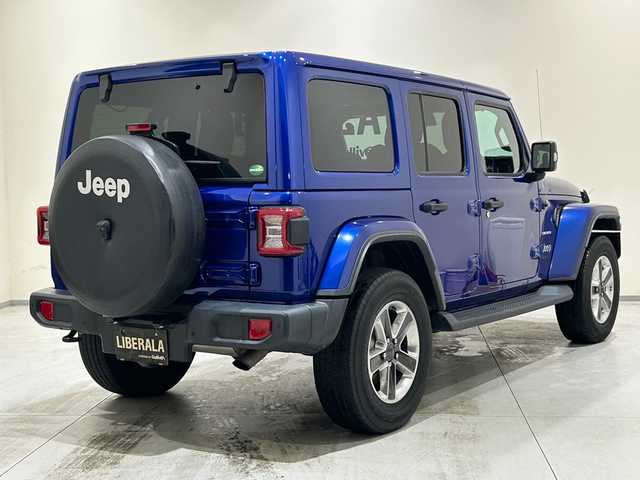 クライスラー・ジープ ジープ ラングラー アンリミテッド サハラ 熊本県 2020(令2)年 5.7万km 青 ・スマートキー/・プッシュスタート/・自動緊急ブレーキ/・前後パークセンス/・ブラインドスポットモニター/・ヒルスタートアシスト/・クルーズコントロール(追従式)/・黒革シート/・前席シートヒーター /・純正メモリナビ/　【BT・USB・AUX・AppleCarPlay・AndroidAuto】/・ALPINEサウンドシステム/・フルセグTV/・バックカメラ/・フロントカメラ/・ETC2.0/・LEDヘッドランプ/・LEDフォグランプ