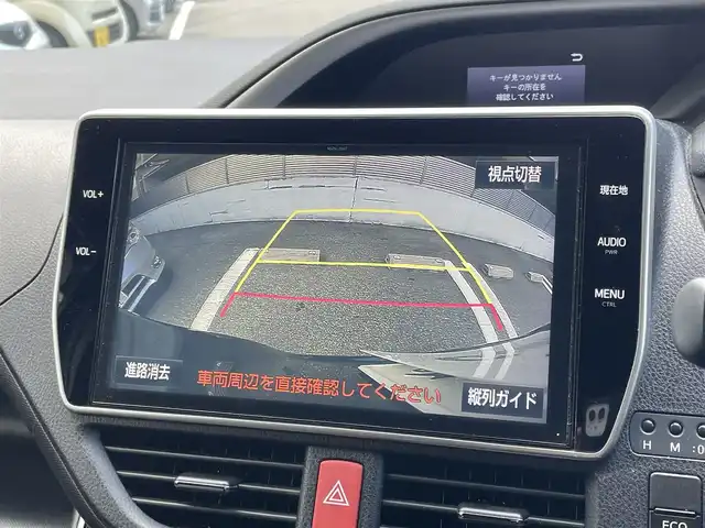 トヨタ ヴォクシー ZS 煌 大阪府 2018(平30)年 4.3万km ブラック 8人乗り/両側電動スライドドア/純正10インチナビ（NSZN-Z66T）/・フルセグ/BT/CD/DVD/AM/FM/バックカメラ/純正12インチ後席用モニター（V12TーR66C ）/トヨタセーフティーセンス/・プリクラッシュセーフティー/・レーンディパーチャーアラート/・オートマチックハイビーム/クルーズコントロール/LEDヘッドライト/純正前方ドライブレコーダー/純正16インチアルミホイール/ETC/保証書/取扱説明書/スペアキー