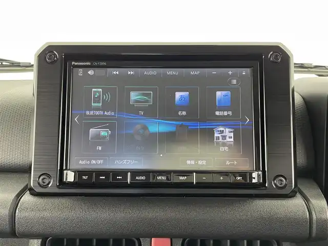 スズキ ジムニー XC 大分県 2024(令6)年 1.1万km ブルーイッシュブラックパール3 ワンオーナー/スズキセーフティーサポート/・衝突軽減ブレーキ/・車線逸脱警報/・ふらつき警報/・ハイビームアシスト/純正ナビ/（Bluetooth/CD/DVD/フルセグ）/社外ステアリング/茶革調シートカバー/前後ドライブレコーダー/４WD/ダウンヒルアシスト/ビルトインETC/クルーズコントロール/前席シートヒーター/ステアリングスイッチ/電動格納ミラー/プッシュスタート/スマートキー/純正フロアマット