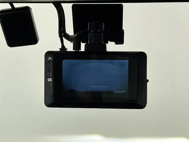 スズキ ジムニー XC 大分県 2024(令6)年 1.1万km ブルーイッシュブラックパール3 ワンオーナー/スズキセーフティーサポート/・衝突軽減ブレーキ/・車線逸脱警報/・ふらつき警報/・ハイビームアシスト/純正ナビ/（Bluetooth/CD/DVD/フルセグ）/社外ステアリング/茶革調シートカバー/前後ドライブレコーダー/４WD/ダウンヒルアシスト/ビルトインETC/クルーズコントロール/前席シートヒーター/ステアリングスイッチ/電動格納ミラー/プッシュスタート/スマートキー/純正フロアマット